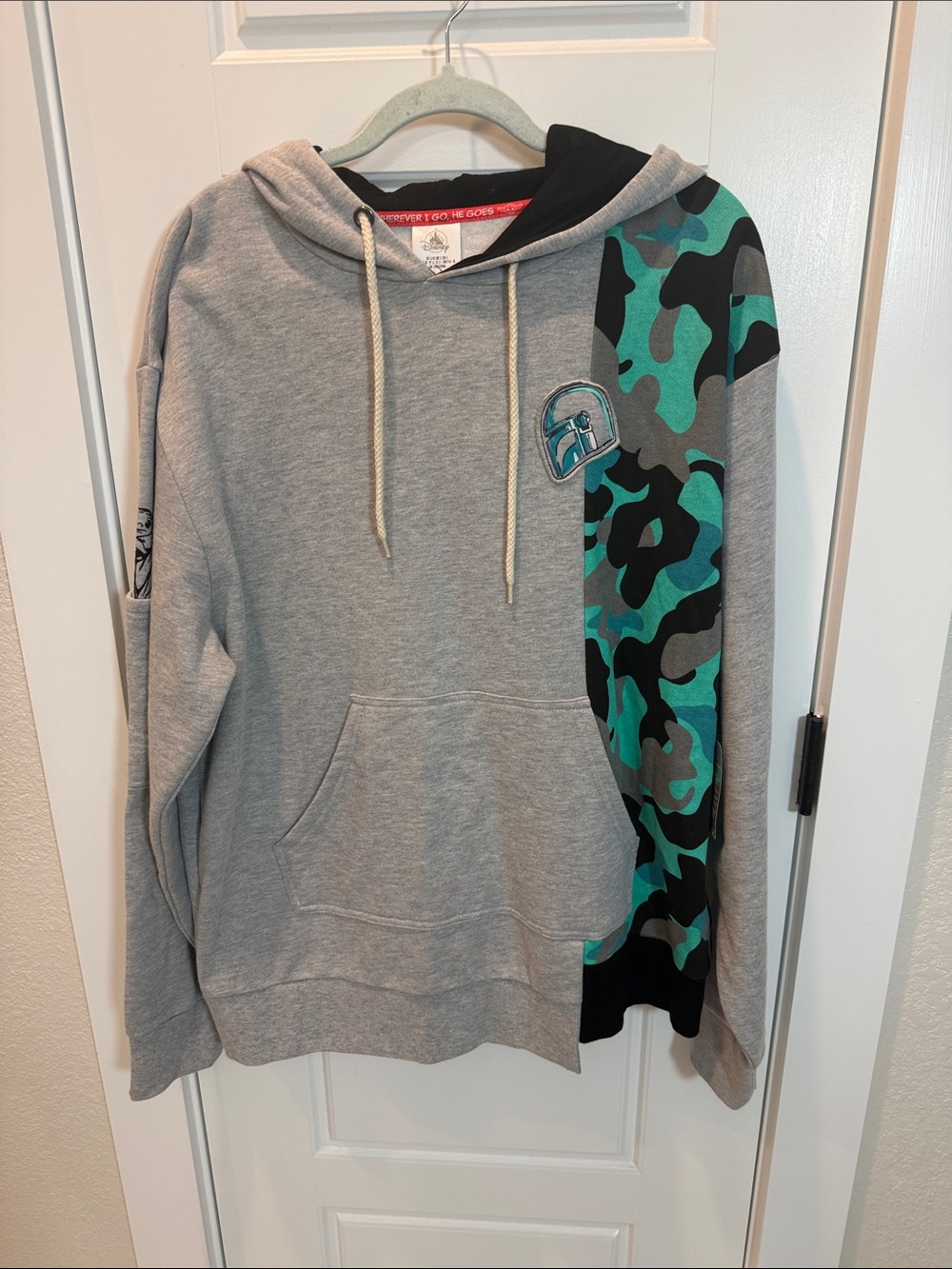 Disney Men's Grey Pullover Hoodie with Teal Camo Panel